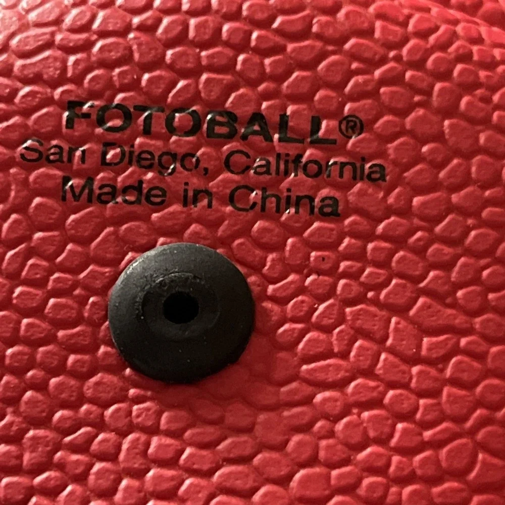 2 Collectible Coca Cola Mini Footballs. (1-leather, 1- foam) approx. 7 inches